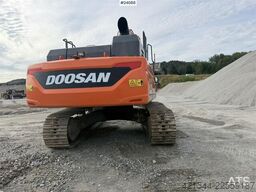 Doosan DX300 LC-5 excavator with digging bucket
