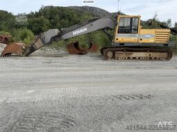 Volvo EC230B excavator with a digging bucket