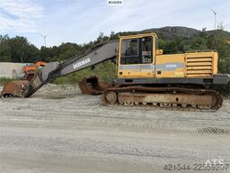 Volvo EC230B excavator with a digging bucket