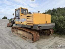 Volvo EC230B excavator with a digging bucket