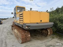 Volvo EC230B excavator with a digging bucket
