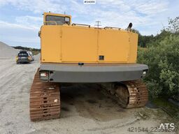 Volvo EC230B excavator with a digging bucket