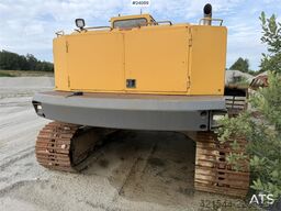 Volvo EC230B excavator with a digging bucket