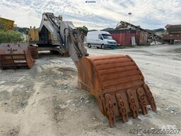 Volvo EC230B excavator with a digging bucket