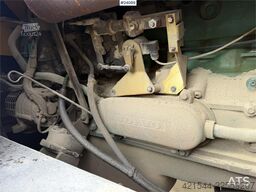 Volvo EC230B excavator with a digging bucket