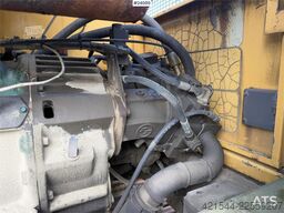 Volvo EC230B excavator with a digging bucket