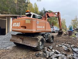 Atlas 1304 w/ 1 backhoe bucket Low Hours!