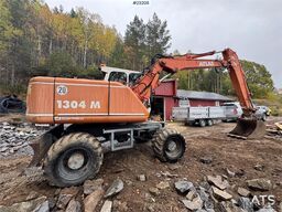 Atlas 1304 w/ 1 backhoe bucket Low Hours!
