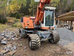 Atlas 1304 w/ 1 backhoe bucket Low Hours!
