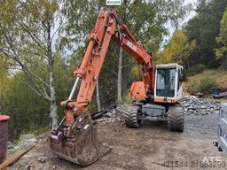 Atlas 1304 w/ 1 backhoe bucket Low Hours!