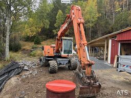 Atlas 1304 w/ 1 backhoe bucket Low Hours!