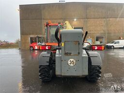 JLG 4017 telehandler w/ two pallet forks and bucket. C