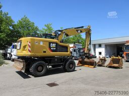 caterpillar M 318 F Schnellwechsler, Reifen neu , 3xSchaufel
