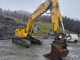 Komatsu PC210LC-11 Excavator with OilQuick quick coupler a