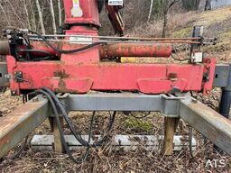 HMF Hermeler Maschinenbau 1150 crane with grab.