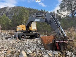 Åkerman EW230 wheeled excavator with two buckets and tiltr