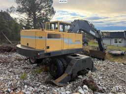 Åkerman EW230 wheeled excavator with two buckets and tiltr