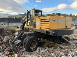Åkerman EW230 wheeled excavator with two buckets and tiltr