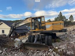 Åkerman EW230 wheeled excavator with two buckets and tiltr