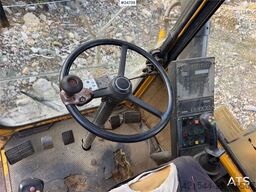 Åkerman EW230 wheeled excavator with two buckets and tiltr