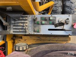 Åkerman EW230 wheeled excavator with two buckets and tiltr