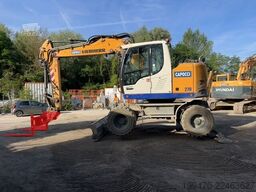 Liebherr A913 Compact Litronic with 3 excavator buckets