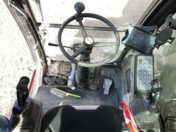 Liebherr A913 Compact Litronic with 3 excavator buckets