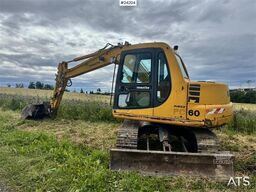 Komatsu PC60-7 Excavator with 2 Buckets