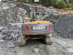 Volvo EC240CL excavator with a tooth bucket