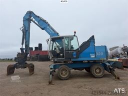 Fuchs MHL 320 wheel machine. WATCH VIDEO