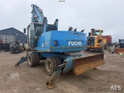 Fuchs MHL 320 wheel machine. WATCH VIDEO