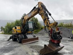 Caterpillar M313 D wheeled excavator with Indexator tilt and S