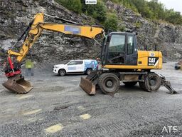 Caterpillar M313 D wheeled excavator with Indexator tilt and S