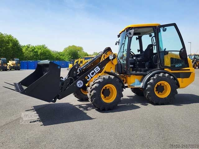 Hjullastare JCB 406 - Stufe V - inkl. Schaufel und Gabel