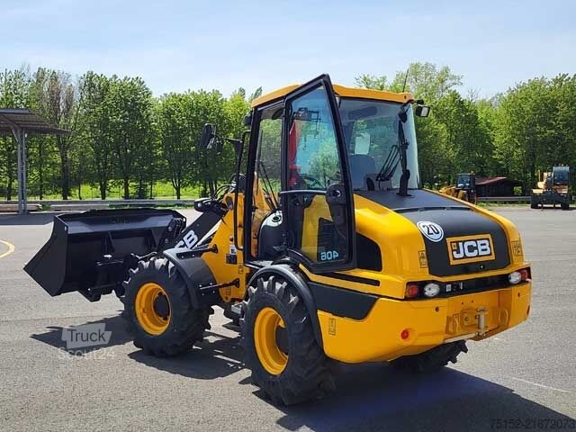 Hjullastare JCB 406 - Stufe V - inkl. Schaufel und Gabel