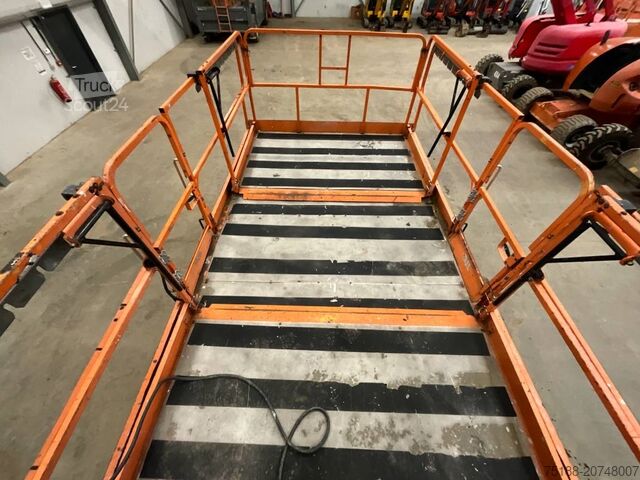 Elevador de tesoura JLG 3394 RT