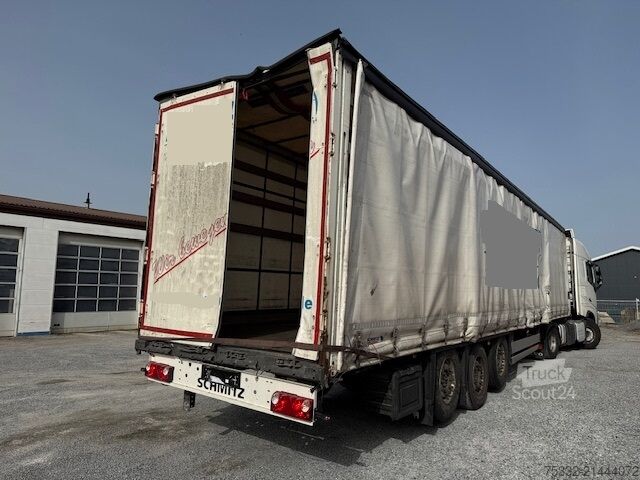 Open oplegger met zeil Schmitz Cargobull 3 achs Tautl 385/65 UNFALL Portal 2xLift