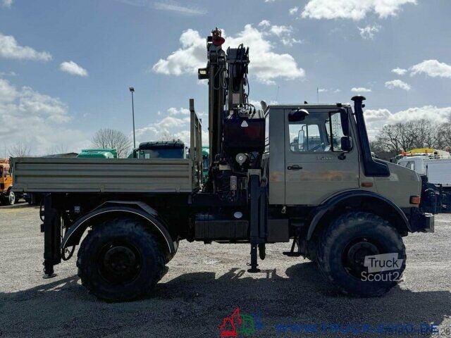 Trójstronna wywrotka Unimog U5000 4x4 Atlas Kran 165.2E 16,5m Höhe + Winde