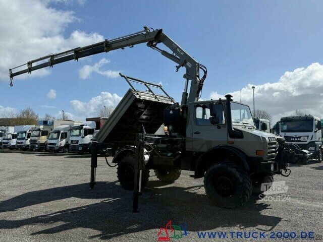 Trójstronna wywrotka Unimog U5000 4x4 Atlas Kran 165.2E 16,5m Höhe + Winde