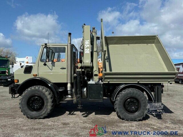 Trójstronna wywrotka Unimog U5000 4x4 Atlas Kran 165.2E 16,5m Höhe + Winde