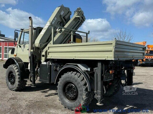 Trójstronna wywrotka Unimog U5000 4x4 Atlas Kran 165.2E 16,5m Höhe + Winde