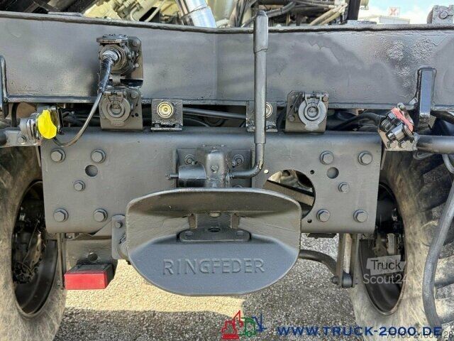 Trójstronna wywrotka Unimog U5000 4x4 Atlas Kran 165.2E 16,5m Höhe + Winde