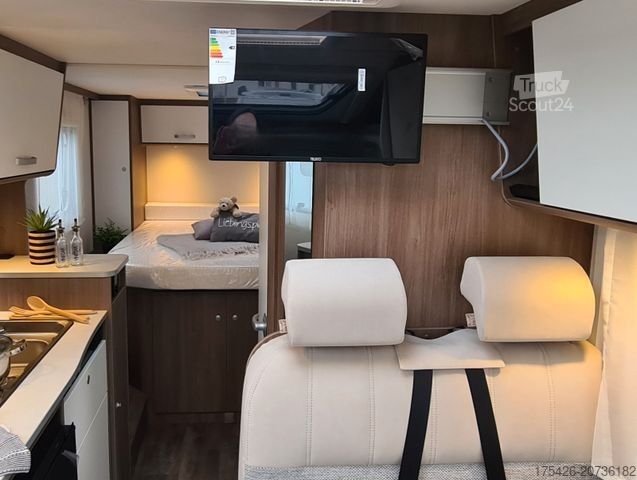 Ημιενσωματωμένο αυτοκινούμενο τροχόσπιτο CARADO V 339 *Queensbett*pro+ Paket*Fußbodenerwärmung*