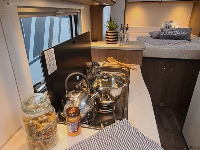 Ημιενσωματωμένο αυτοκινούμενο τροχόσπιτο CARADO V 339 *Queensbett*pro+ Paket*Fußbodenerwärmung*