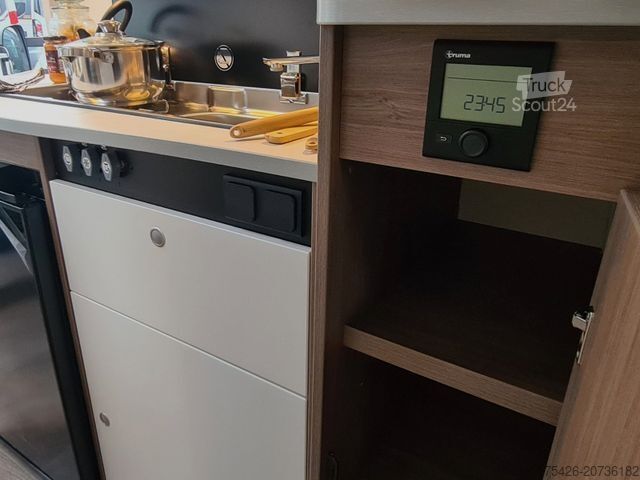 Ημιενσωματωμένο αυτοκινούμενο τροχόσπιτο CARADO V 339 *Queensbett*pro+ Paket*Fußbodenerwärmung*