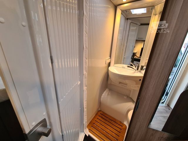 Ημιενσωματωμένο αυτοκινούμενο τροχόσπιτο CARADO V 339 *Queensbett*pro+ Paket*Fußbodenerwärmung*