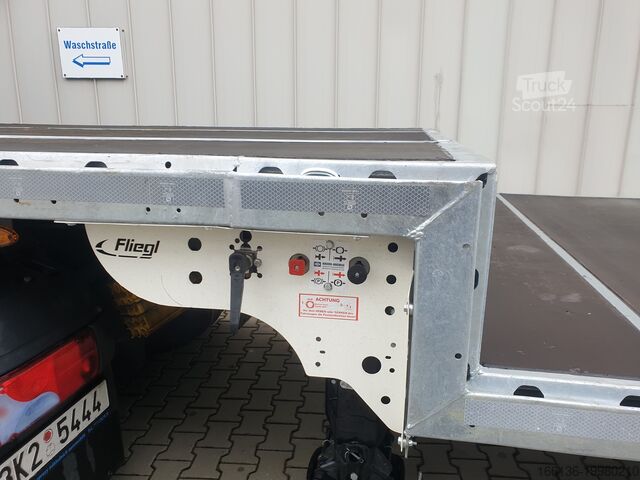 Напівпричіп з відкритою платформою FLIEGL 3-Achs Jumbo Plateau SDS 390