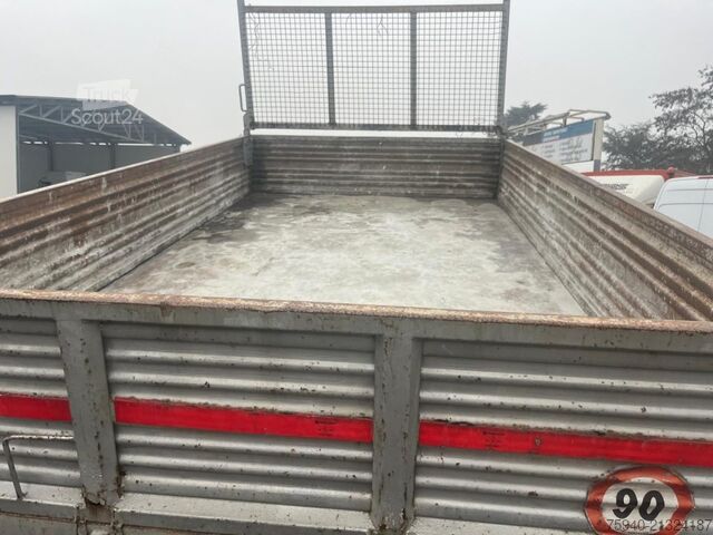 Camión volquete trilateral IVECO EUROCARGO  65E12