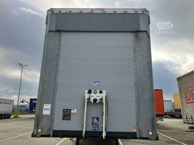 Open semitrailer with tarp Fliegl Mega SDS 390