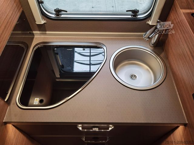 Teilintegriertes Wohnmobil WEINSBERG CARASUITE 650 MG / 140PS / HECKBETT & HUBBETT